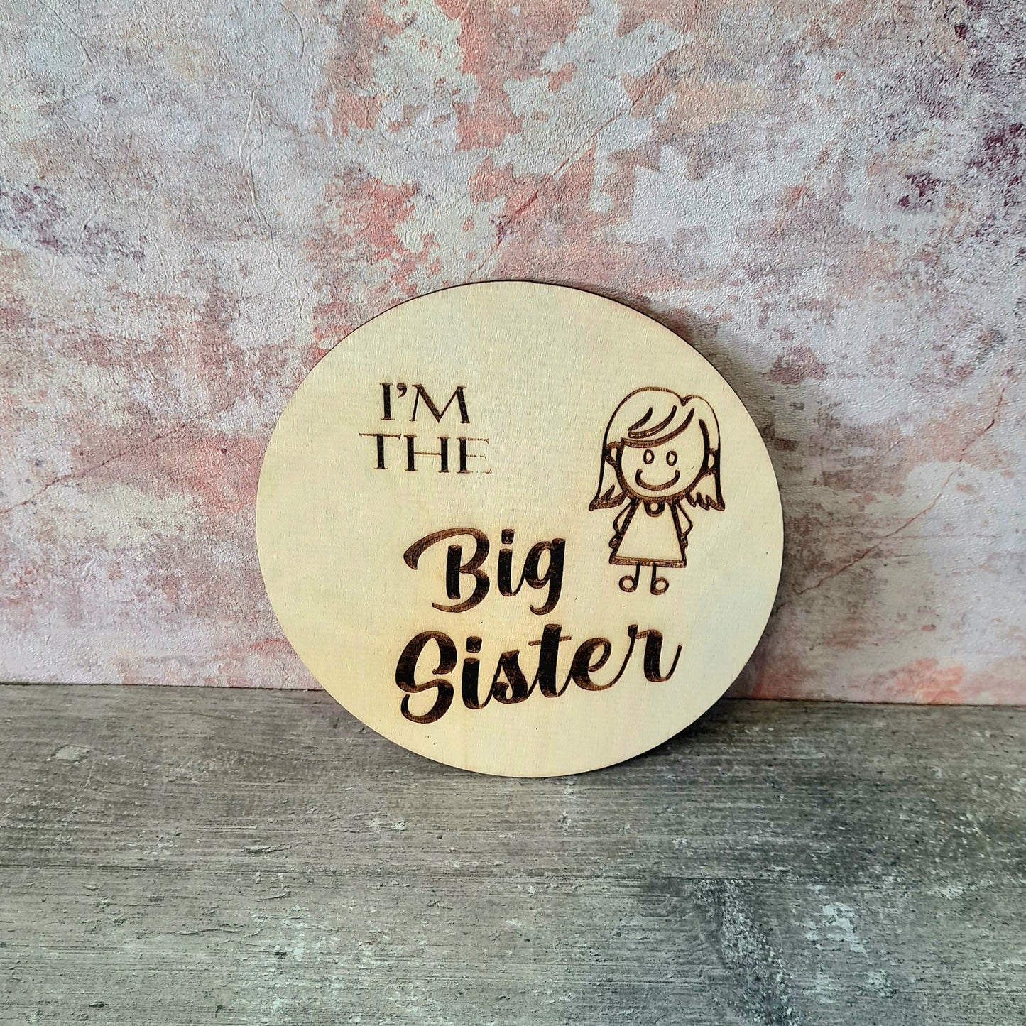 Personalised wooden sibling pregnancy announcement sign engraved with custom name