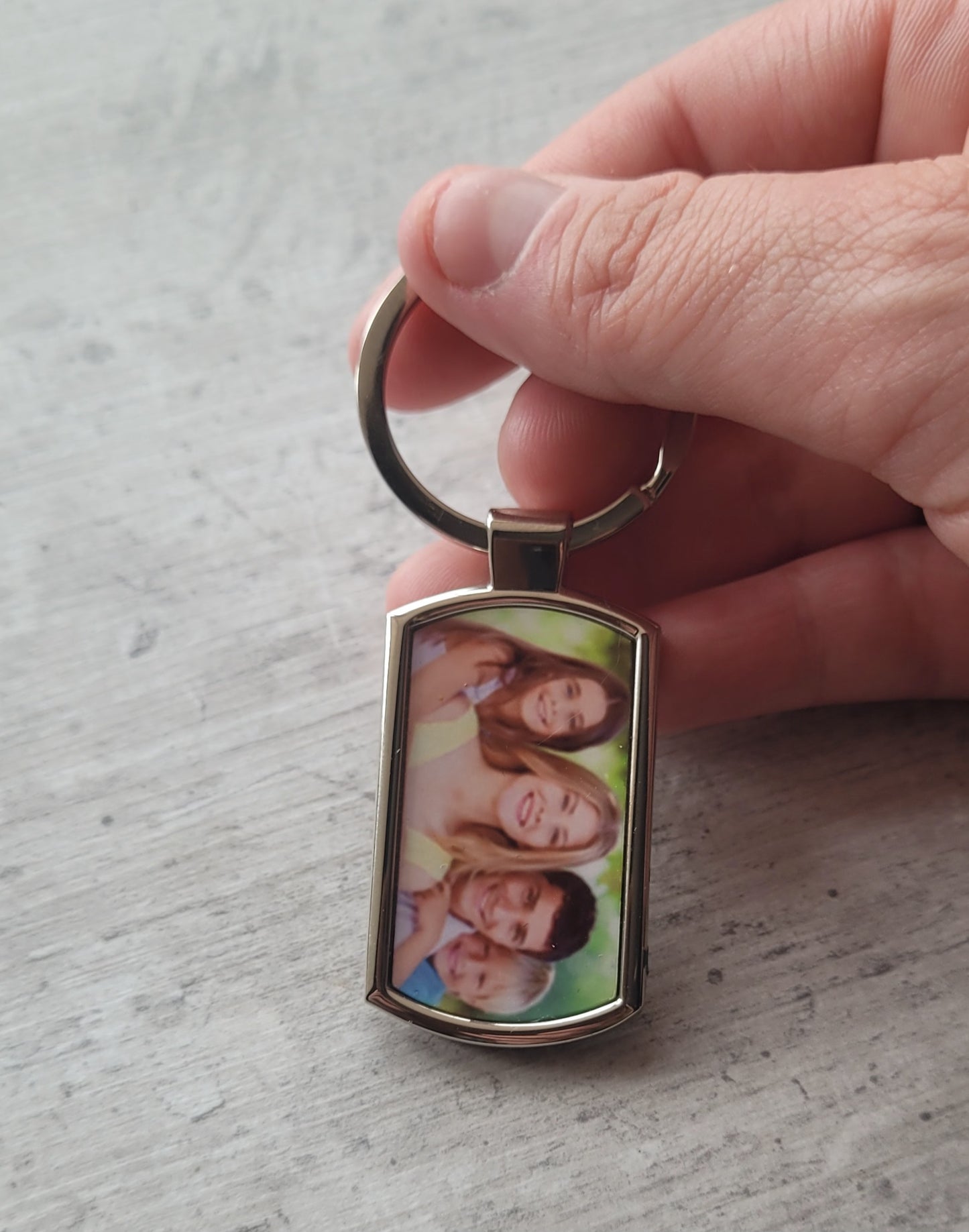 Family memory photo keyring shown flatlay