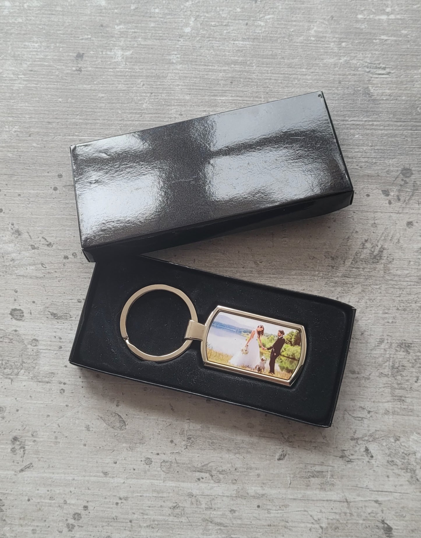 Close-up of printed photo detail on keyring