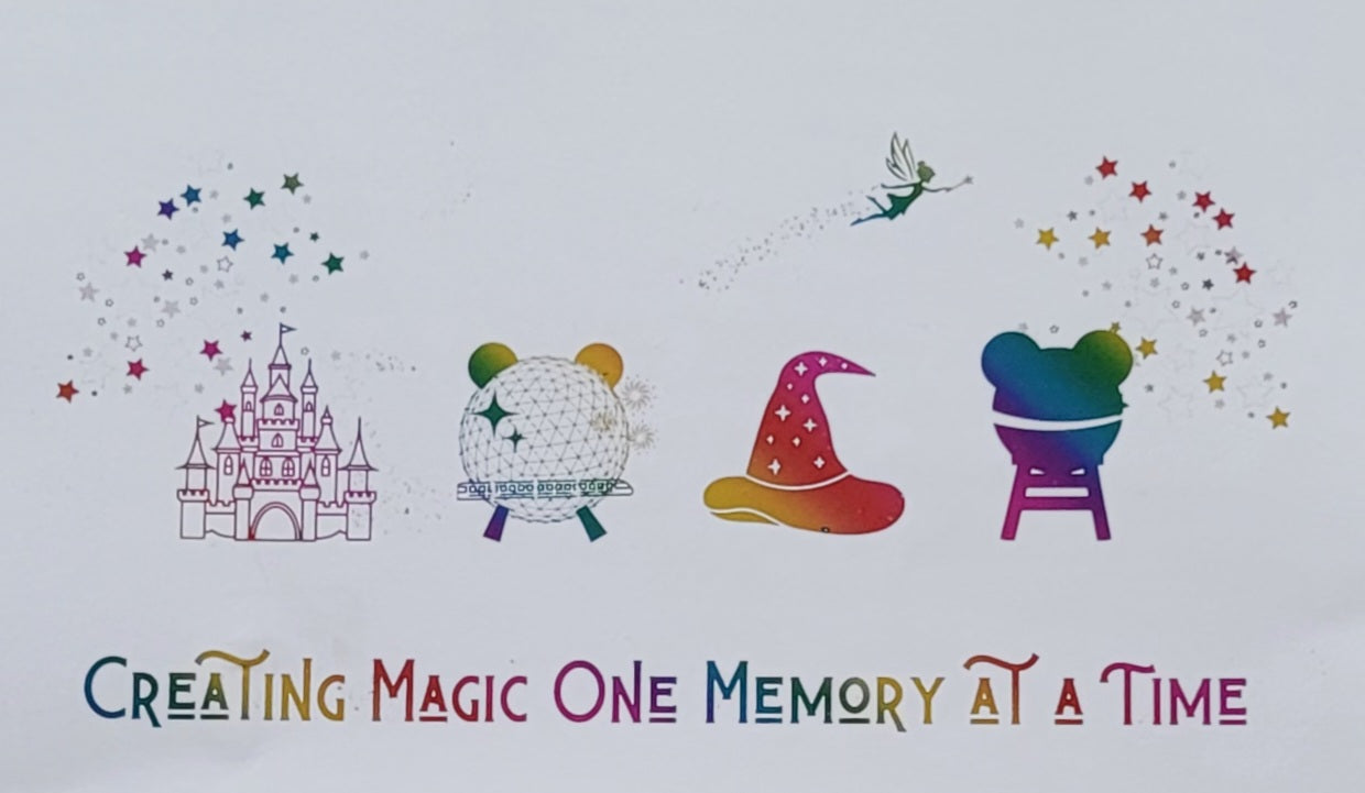 Close-up of rainbow coloured foil Disney-inspired artwork inside black photo frame