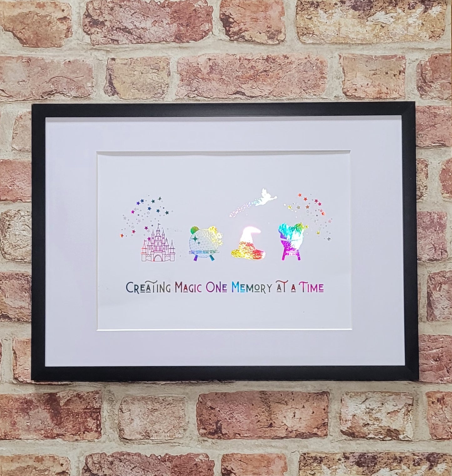 Disney-inspired family keepsake framed in frame with shimmering foil