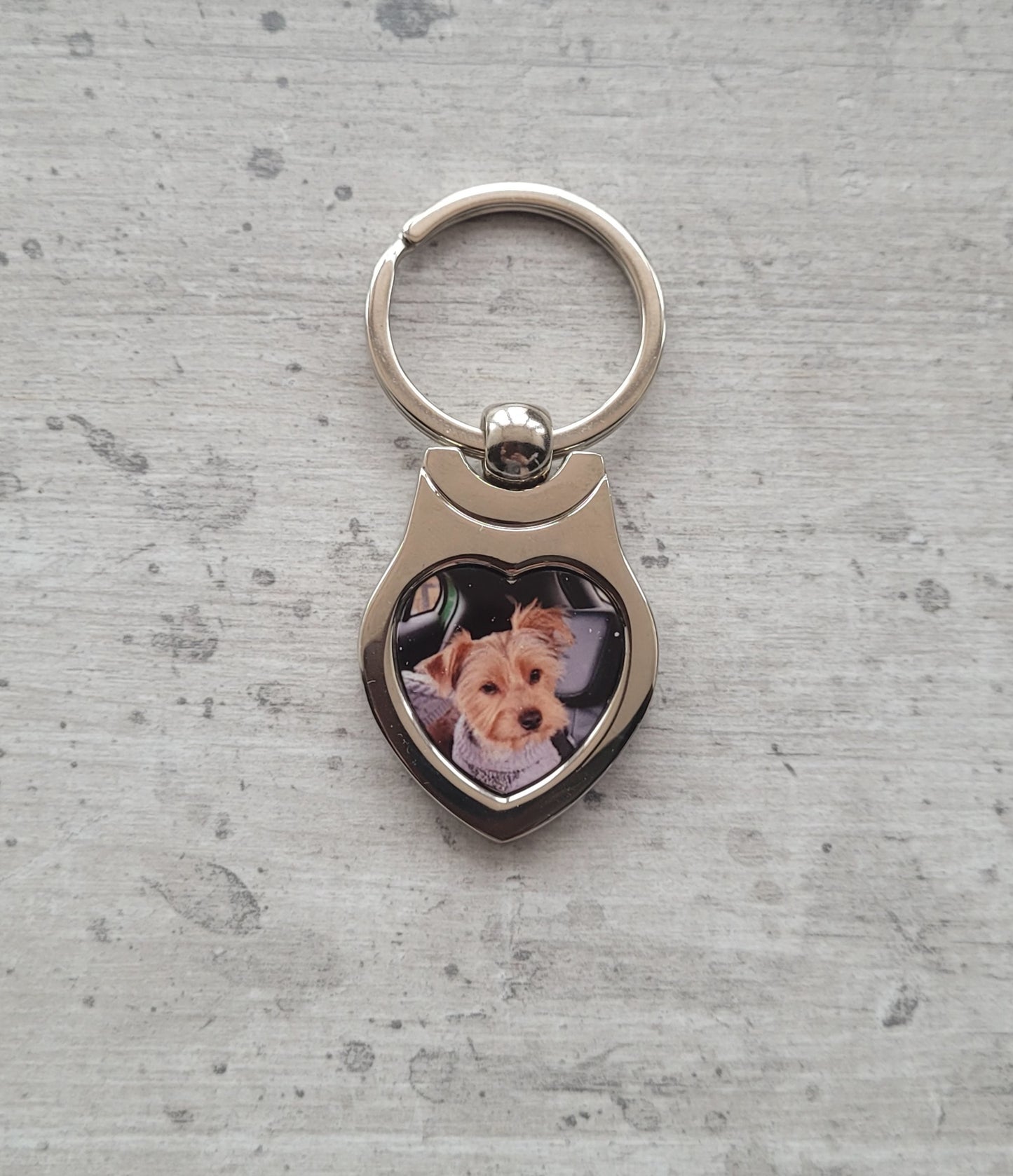 Dog pet photo heart keyring displayed on tabletop