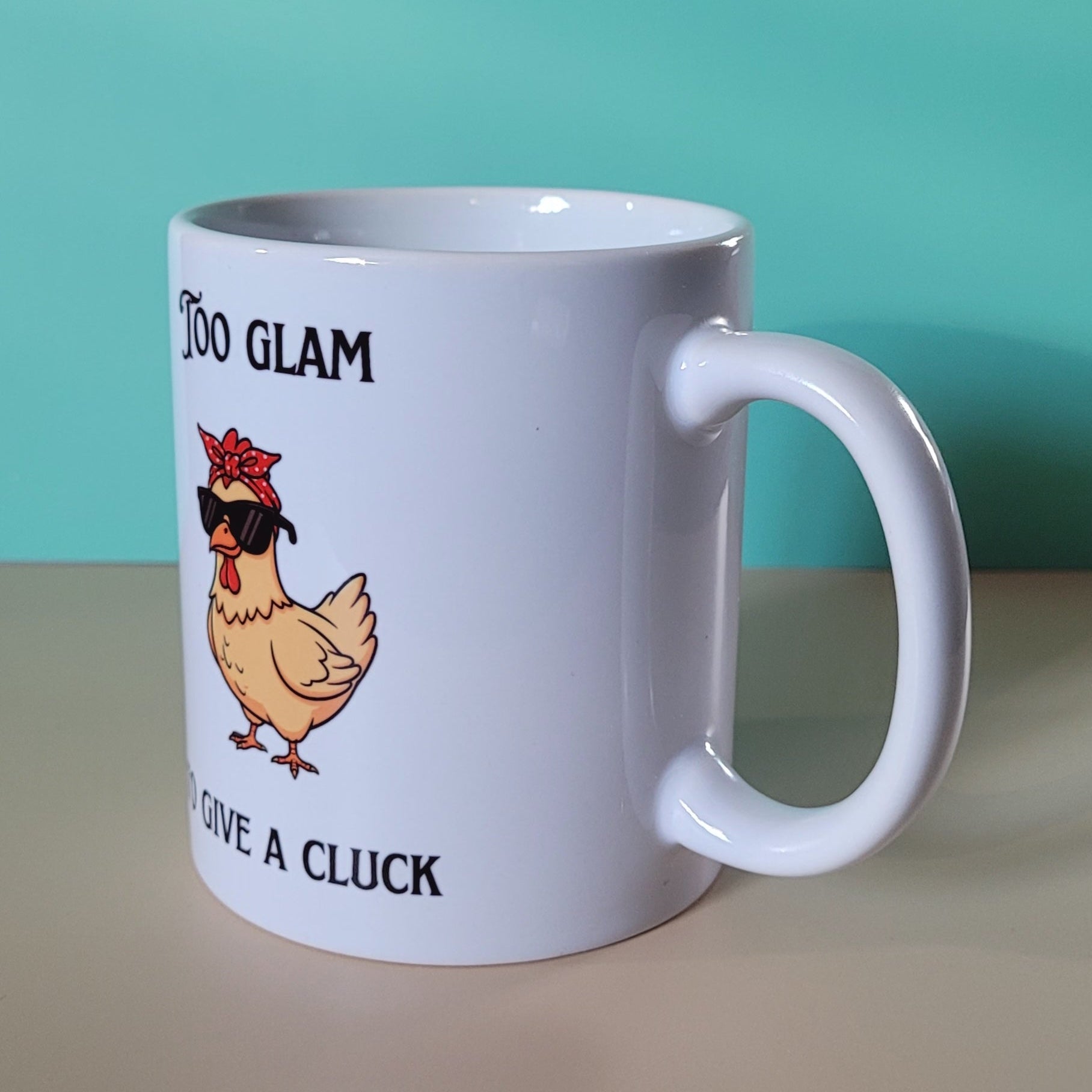 Side angle of chicken humour mug with sunglasses chicken illustration.”