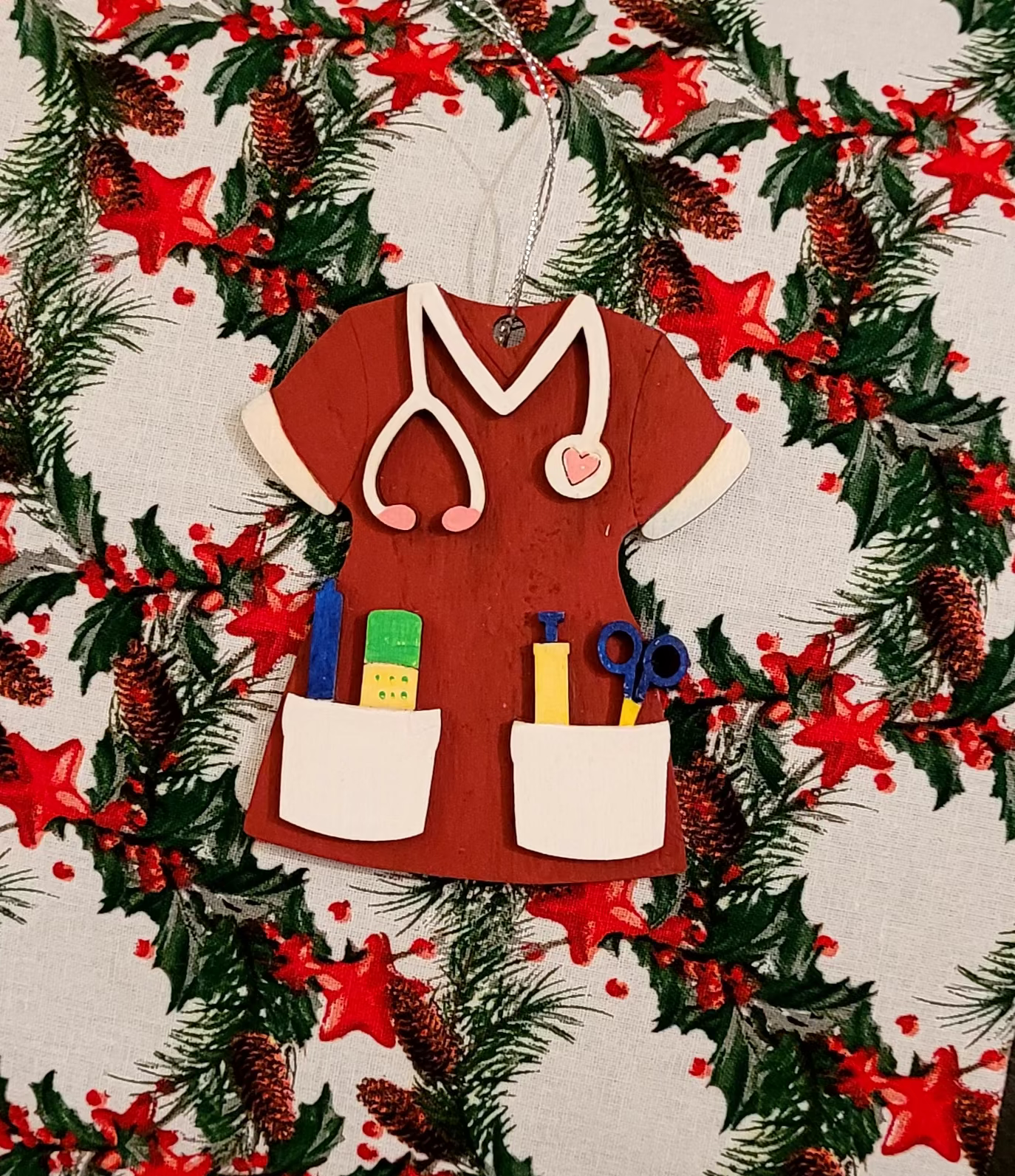 Personalised Nurse Uniform Christmas Decoration – NHS Scrubs Ornament (Blue, Green or Red)