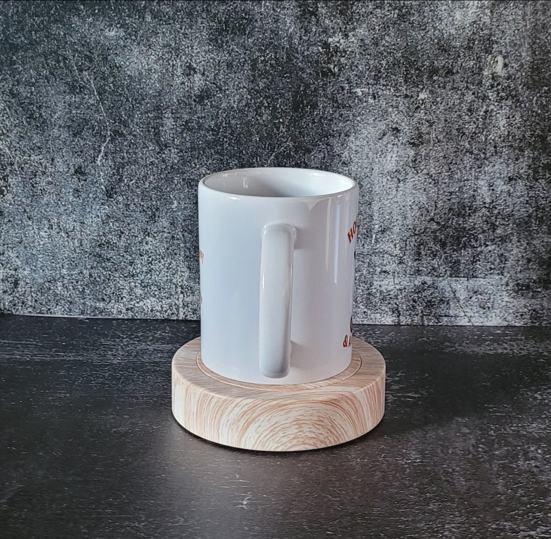Witch mode funny mug displayed on wooden stand.