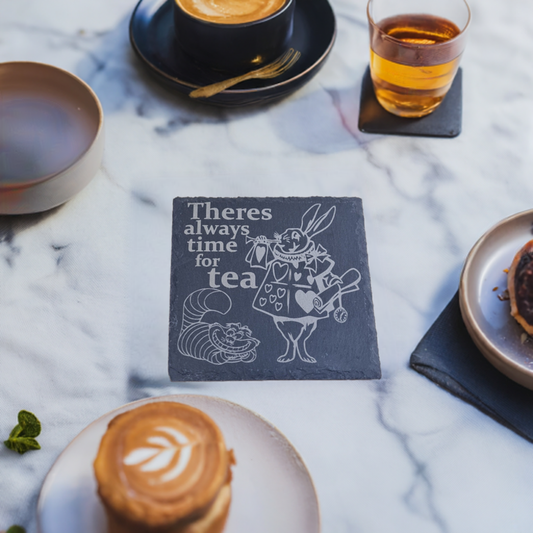 alice in wonderland rabbit coaster on a marble counter top