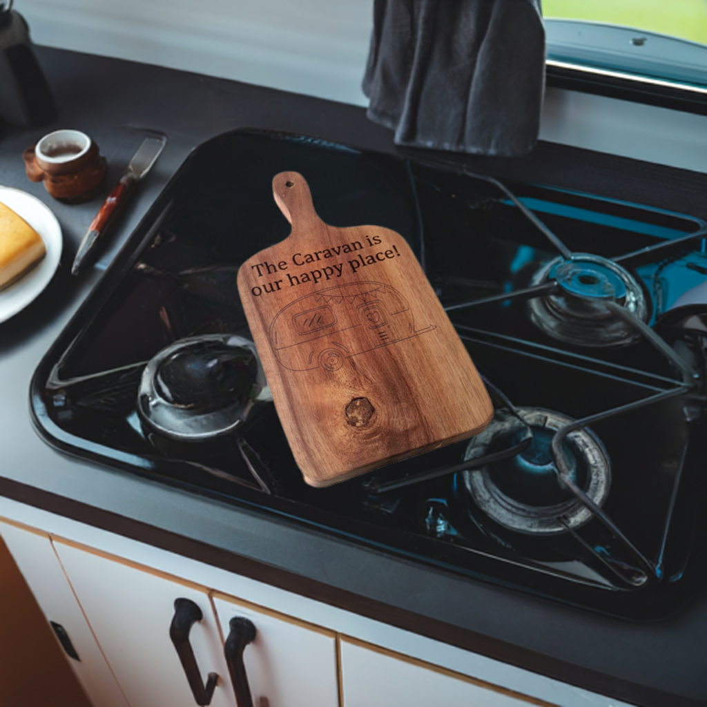 caravan wooden chopping board on a gas stove