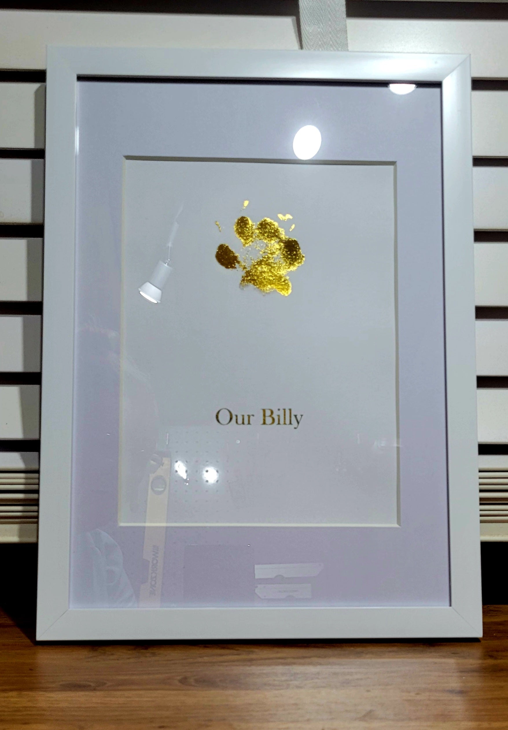 White framed paw print