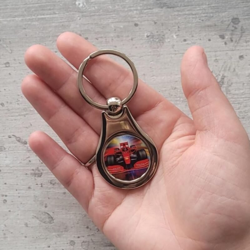 Personalised round photo keyring with custom printed car photo insert.