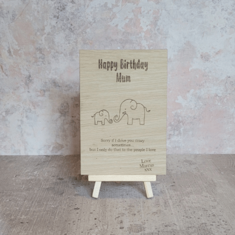 Wooden keepsake birthday card for mum displayed on small easel against neutral background