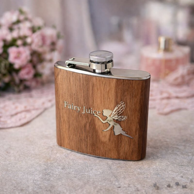 wooden hip flask 6oz engraved with a fairy and the words Fairy Juice