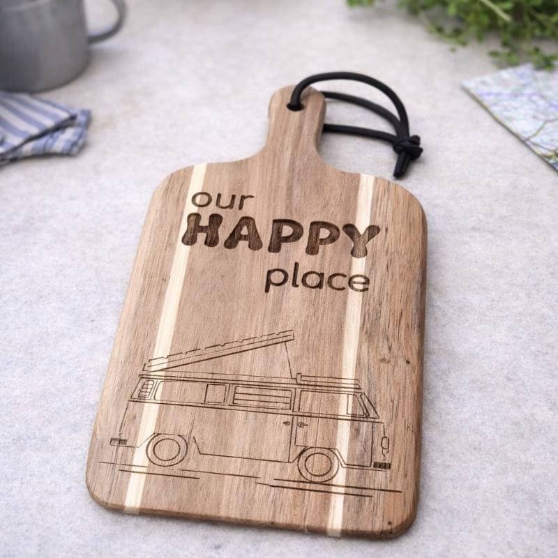 VW camper custom engraved wooden chopping board engraved with our happy place on a light kitchen background