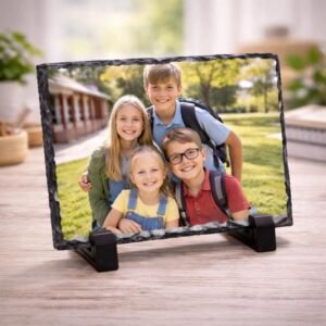 slate family photo frame with children's photo standing on a light side 