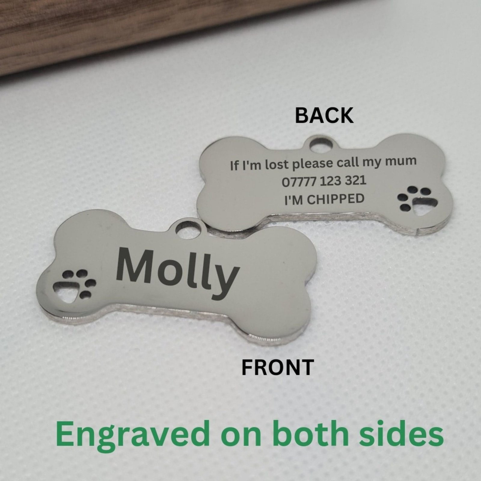 personalised stainless steel bone shaped dog name tag engraved with dog name