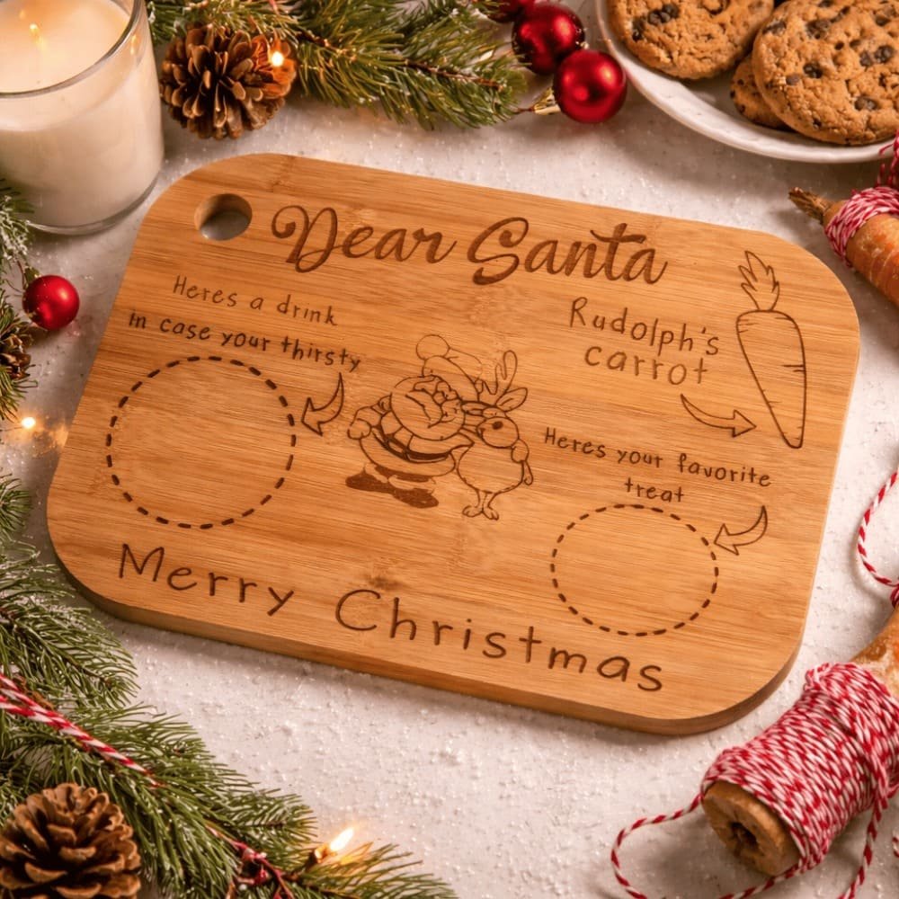 Personalised engraved wooden Christmas Eve board for Santa and Rudolph featuring spaces for festive treats, a handmade Christmas keepsake for families.