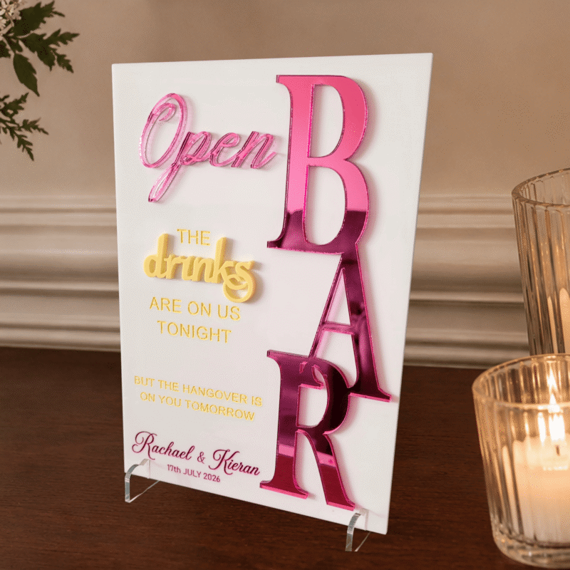 Luxury personalised A5 acrylic Open Bar wedding sign with raised mirrored acrylic lettering, layered yellow acrylic details, engraved hand-painted wording and clear acrylic display feet.