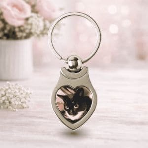 Personalised heart-shaped photo keyring featuring a custom pet photograph, a thoughtful personalised gift for pet lovers.